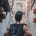 man holding black backpack